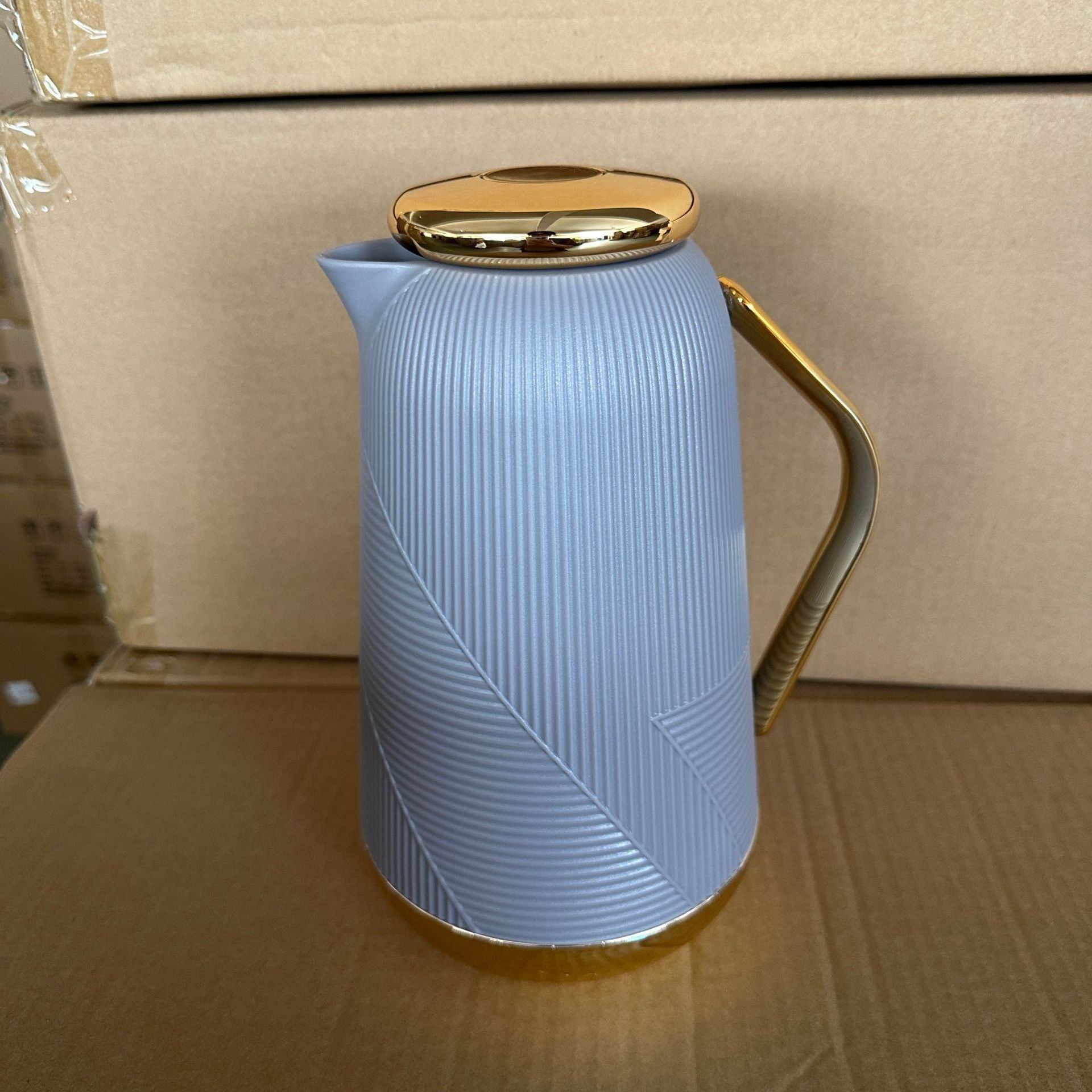Modern minimalist gold-plated vacuum insulated kettle, luxurious home office party perfect gift with lid and accessible hot water bottle