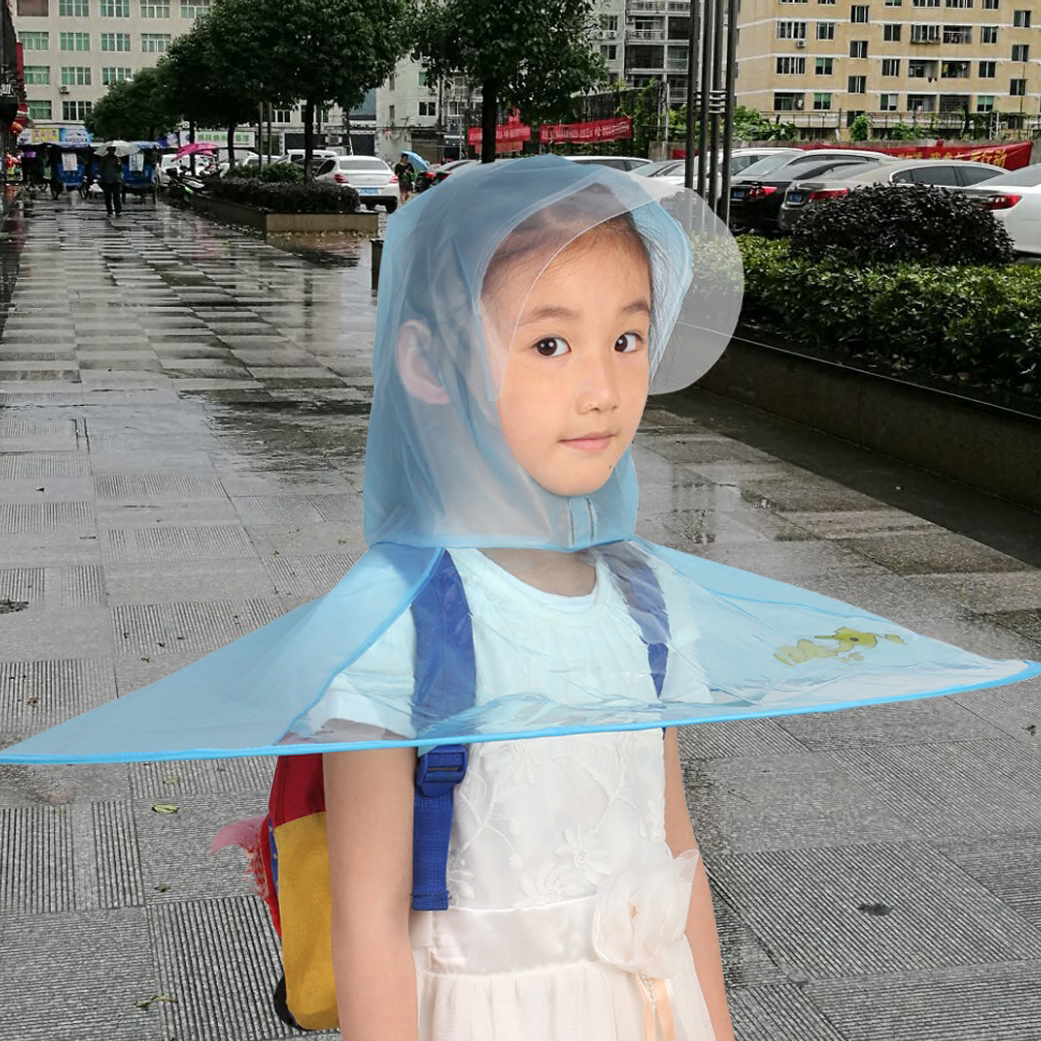 Students wear transparent cloaks and rain hats