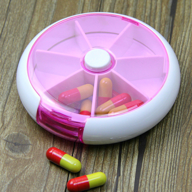 Rotating 7-cell portable medicine box