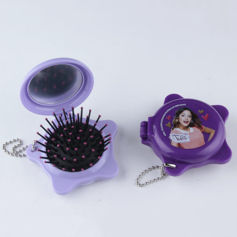Folding mirror comb