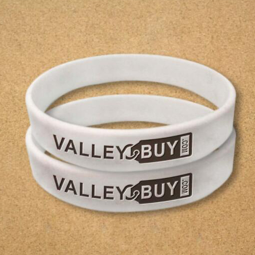 Embossed silicone wrist strap