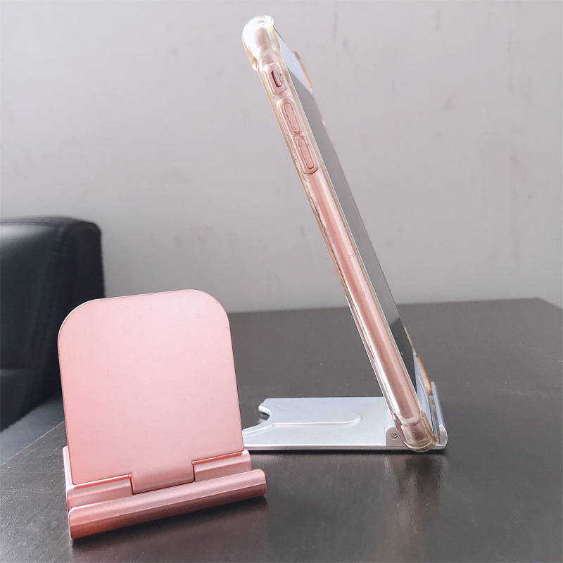 Folding mobile phone holder