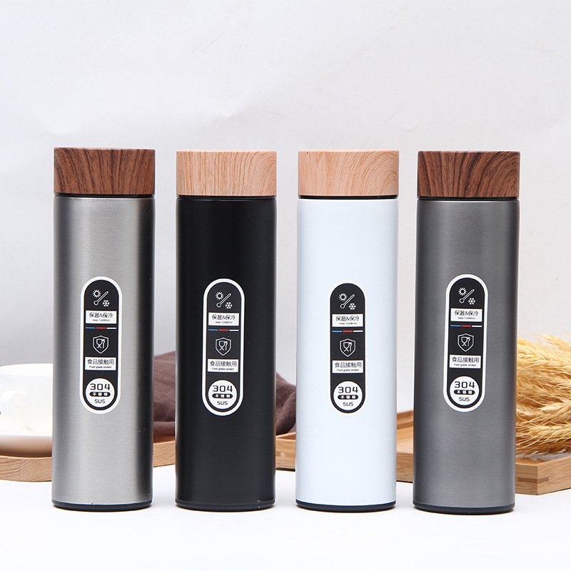 Stainless steel insulated cup with wooden cover